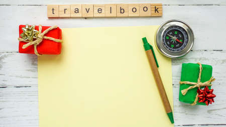 travel book. compass blank sheet of paper photoの写真素材