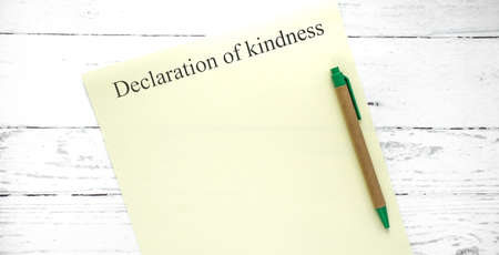 worlh kindness day. words from wooden cubes with letters. good heart