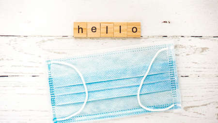 World Hello Day.words from wooden cubes with letters photoの写真素材