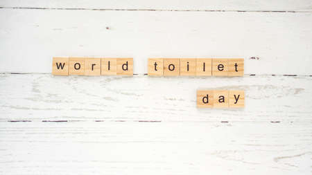 World Toilet Day.words from wooden cubes with letters photo