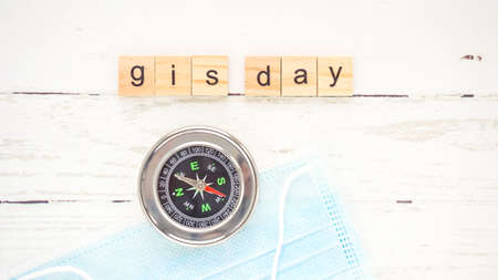 Geographic Information Systems Day.words from wooden cubes with letters photo