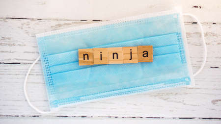 Day of the Ninja.words from wooden cubes with letters photo