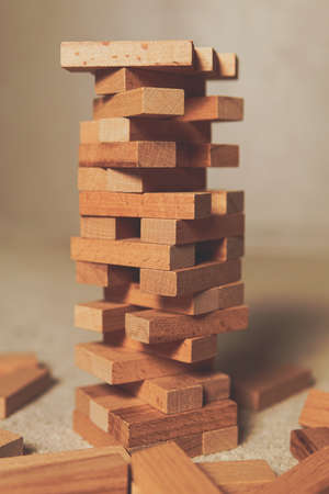 Janga wooden box. An imbalance. destruction of blocks. Mistake. Entertainment activities. A game of physical and mental skill.の写真素材