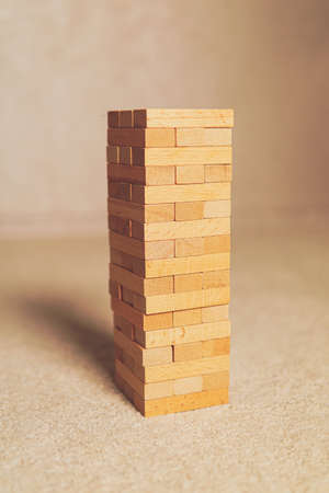 Janga wooden box. An imbalance. destruction of blocks. Mistake. Entertainment activities. A game of physical and mental skill.の写真素材