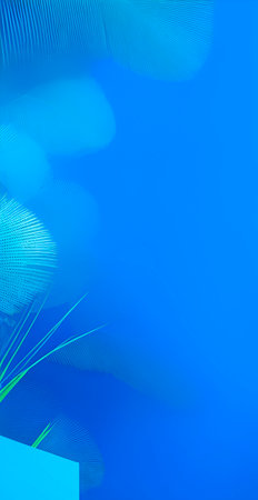 abstract blue background with some soft shades on it and some palm leavesの素材