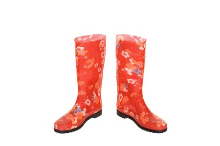 colored waterproof boots (gumboots) isolated on whiteの写真素材