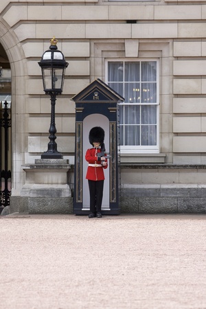 London - June 21, 2009: Sentry of the Grenadier Guards posted outside of Buckingham Palace on June 21, 2009 in London, United Kingdom. The Grenadier Guards traces its lineage back to the year 1656. のeditorial素材