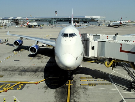 London - May 24, 2009: A British Airways 747 jumbo jet parks at gate at Heathrow Airport in London on May 24, 2009. Heathrow had 65.7 million passengers arriving and departing in 2010. のeditorial素材