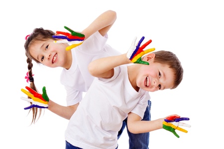 Happy kids with painted hands, isolated on whiteの写真素材
