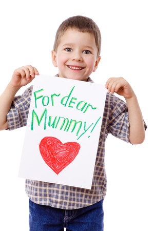 Little boy holding a drawing for mum, isolated on whiteの写真素材