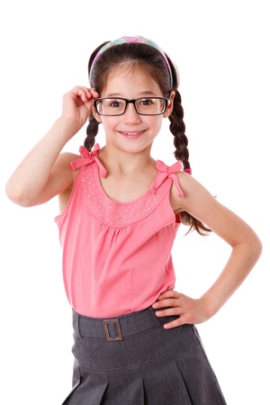 Adorable girl holding a glasses, isolated on whiteの写真素材