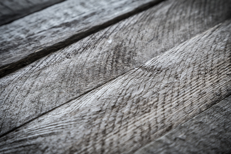 Gray wood diagonal plank texture. Abstract background, shallow focusの写真素材