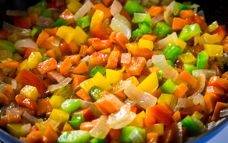 Background with raw sliced vegetables on frying panの写真素材