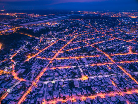 Evening aerial view to residential area Zhuravlivka in Kharkiv with snow, Ukraineの写真素材