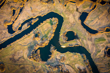 Aerial view to spring floodplain of Siverskyi Donets river. Directly above view. Kharkiv region,...