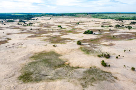 Aerial view to natural Ukrainian desert near Kitsevka, Kharkiv region. Sand desert formed by soil erosionの写真素材