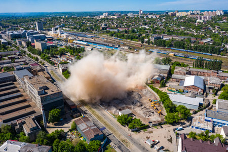 Kharkiv, Ukraine - 23 may 2021: Aerial view of dust cloud after collapsing of old building after demolishingのeditorial素材