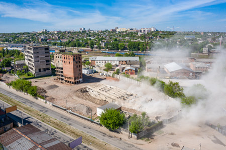 Kharkiv, Ukraine - 16 may 2021: fallen tower of old abandoned concrete grain elevator building after undermining, Aerial viewのeditorial素材