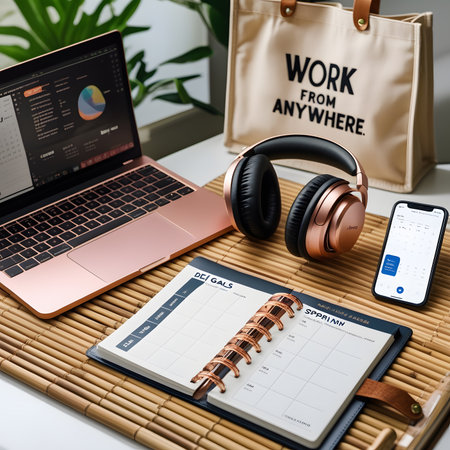 Work from home concept with notebook, laptop, headphones and mobile phoneの素材