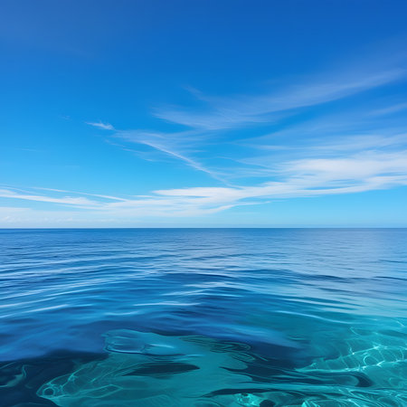 Blue sea surface and blue sky with clouds. Seascape.の素材