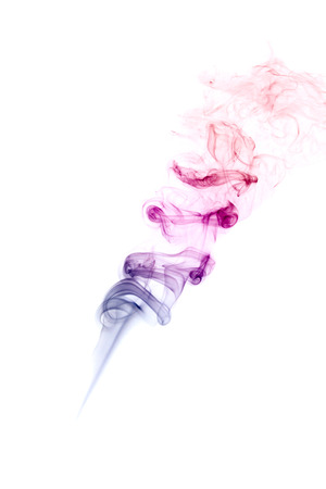 colored smoke isolated on white backgroundの写真素材