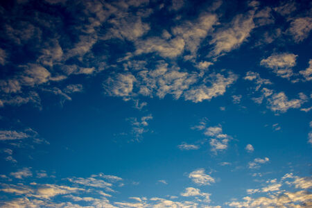 White clouds on the blue sky.