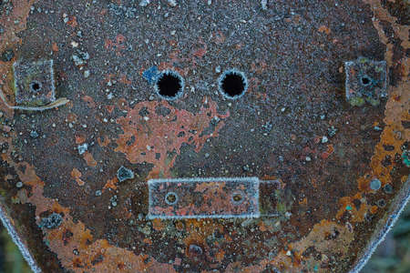 Rusty surface with holes and protrusions.の写真素材