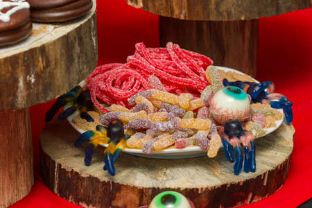 Sweets and marmelad for Halloween on the holiday table.の写真素材