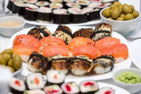Fresh and delicious sushi and rolls of rice and fresh fish.