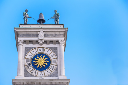 Clock tower, with bell and robots to play it