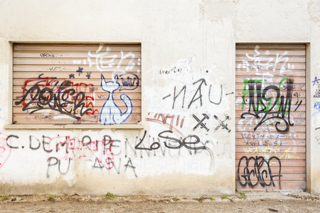 Acts of vandalism.Beautiful street art graffiti. Abstract creative drawing fashion colors on the walls of the city. Urban Contemporary Cultureのeditorial素材