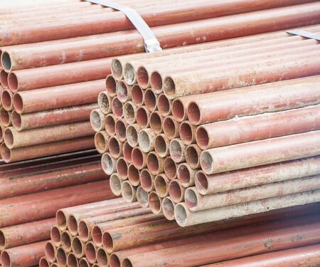 Stack of steel pipes for scaffolding in stock.の写真素材