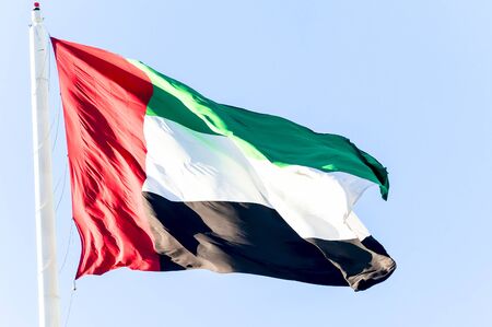 United Arab Emirates flag waving on the windの写真素材
