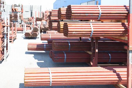 Steel Pipes bunch on the rack in warehouse