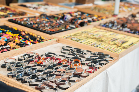 Selective focus on leather bracelets. Jewellery display stand.の写真素材