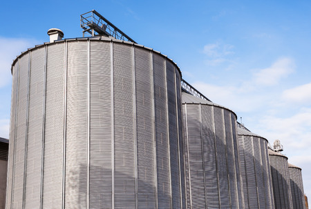 Agricultural Silos. Building Exterior. Storage and drying of grains, wheat, corn, soy, sunflower...