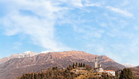 Mountain landscape with castle and belfry. Artegna Friuli Italyの写真素材