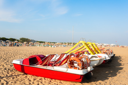 Colorful series of pedalo parked on the beachの写真素材