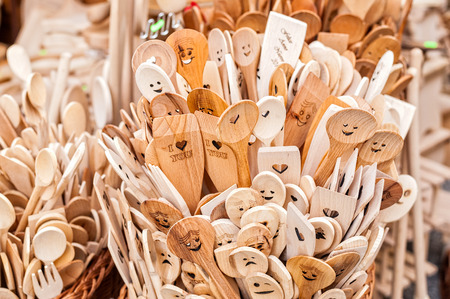 Wooden kitchen utensils for sal at market.の写真素材