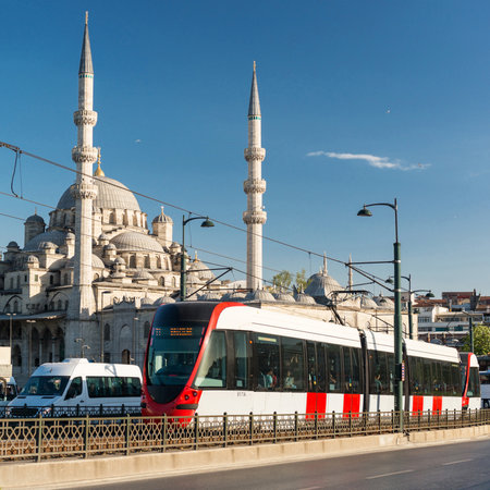 A modern tram rides over the Galata Bridge on may 24, 2013 in Istanbul, Turkey  Istanbul is a modern city with a developed infrastructure のeditorial素材