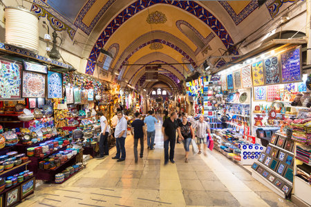 Tourists visiting the Grand Bazaar on may 27, 2013 in Istanbul, Turkey  The Grand Bazaar is the oldest and the largest covered market in the world, with 61 covered streets and over 3,000 shops のeditorial素材