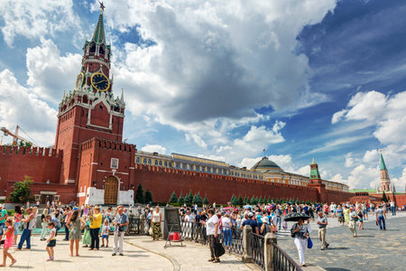 Tourists visiting the Red Square on july 13, 2013 in Moscow, Russia  The Kremlin is the main attraction of the Red Square のeditorial素材