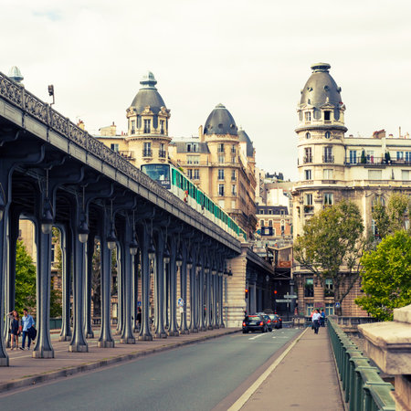 Old street, metro runs high between buildings in Paris  Vintage photo のeditorial素材