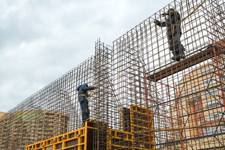 Construction site workers on april 3, 2014 in Moscow, Russia  Urban construction is at a faster pace...