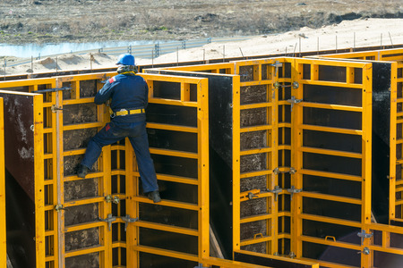 Construction site worker on the formwork on april 10, 2014 in Moscow, Russia  Urban construction is...