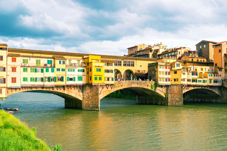 Ponte Vecchio over Arno river in Florence, Italy  Vintage photo の写真素材