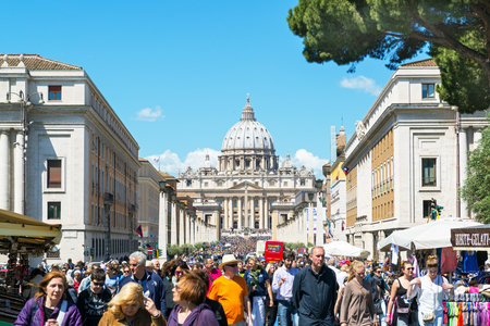 Crowds of tourists walk around the Cathedral of St  Peter  のeditorial素材