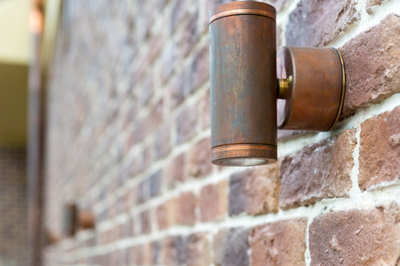 Lamp on the outside wall of the houseの写真素材