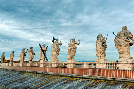 Statues on the roof of the Cathedral of St  Peter in Rome, Italyの写真素材