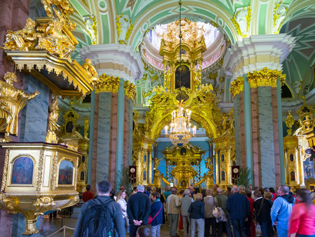 ST PETERSBURG, RUSSIA - JUNE 13, 2014: Tourists visit the Peter and Paul Cathedral. Russian emperors are buried here.のeditorial素材